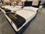 Double Lawrence & Quigley divan bedstead with mattress
